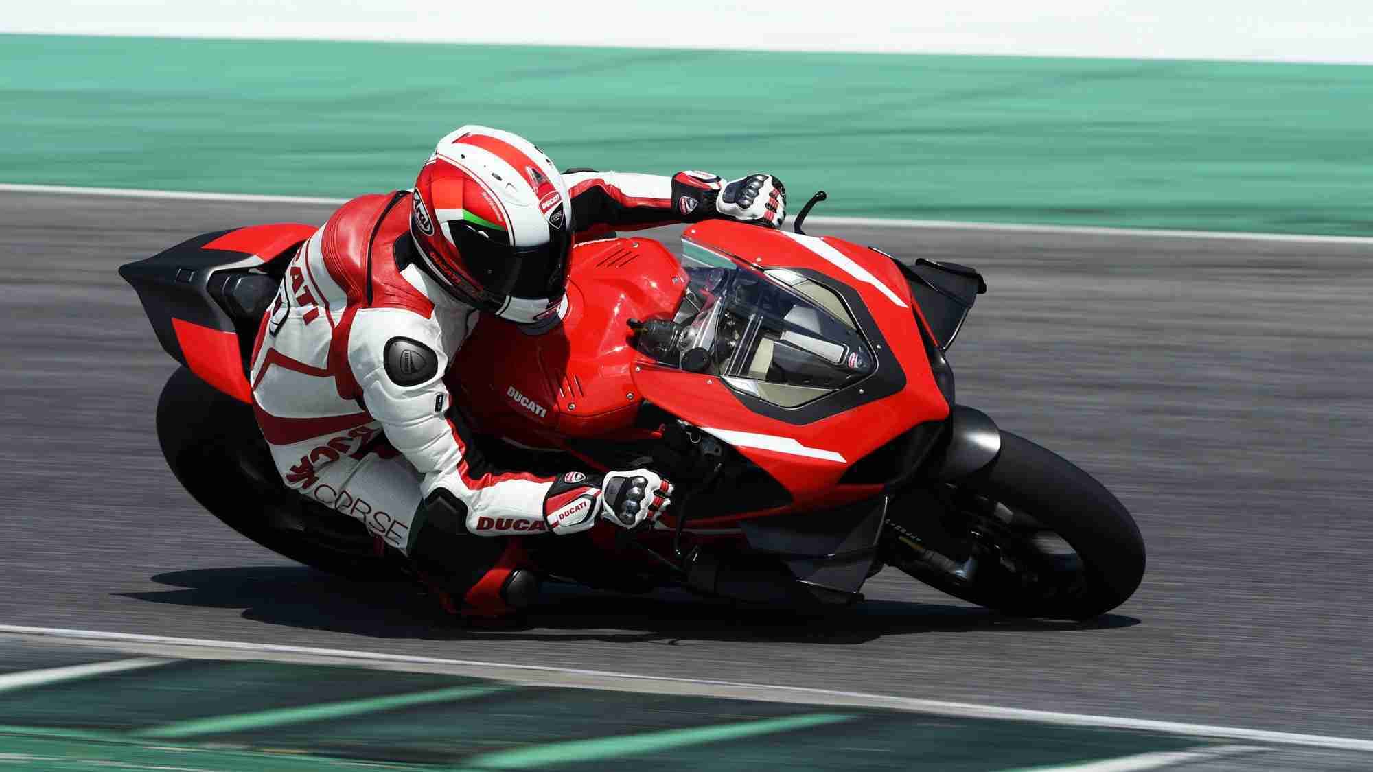 Claudio Domenicali riding the Ducati Superleggera V4