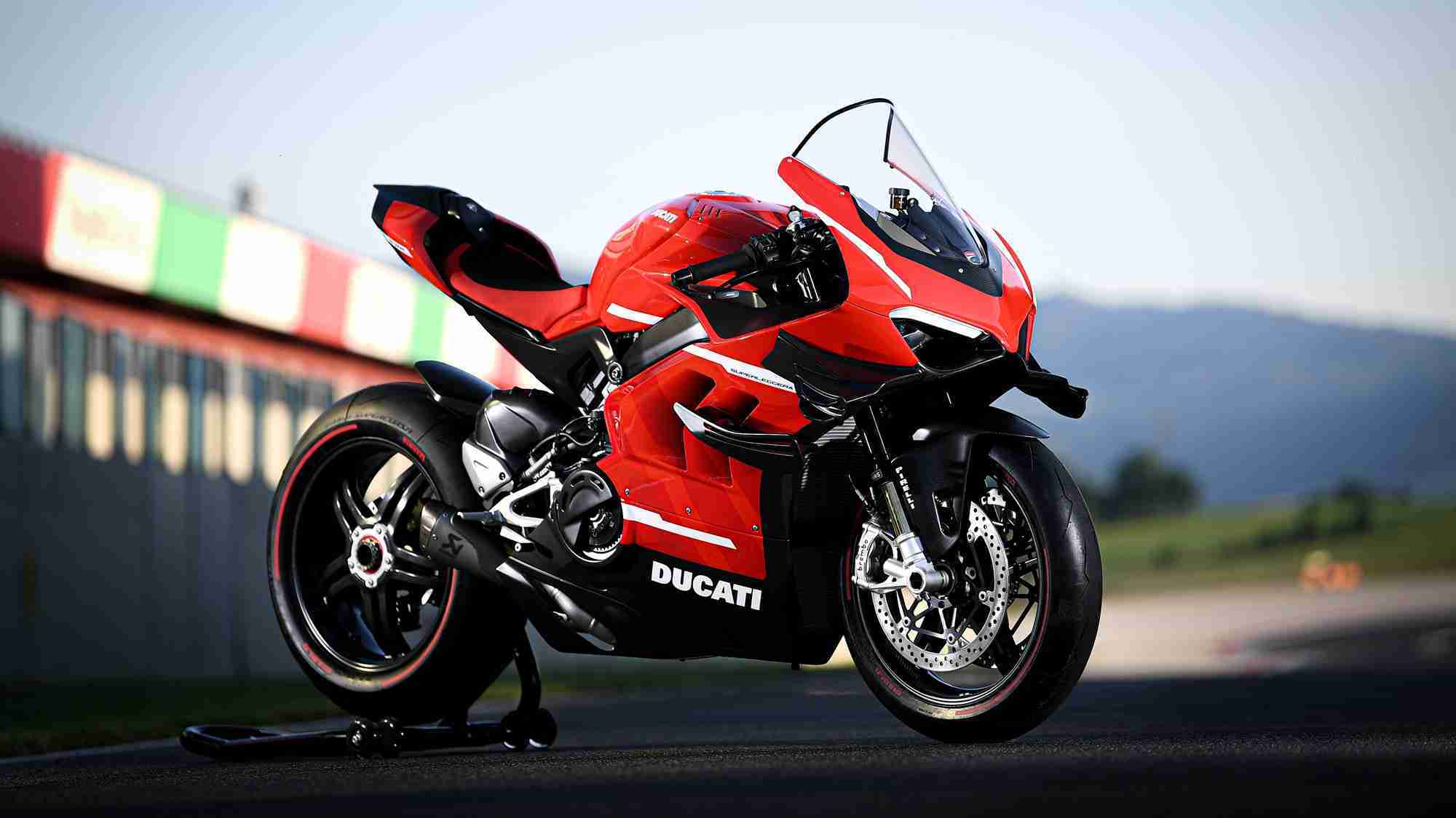 Claudio Domenicali riding the Ducati Superleggera V4