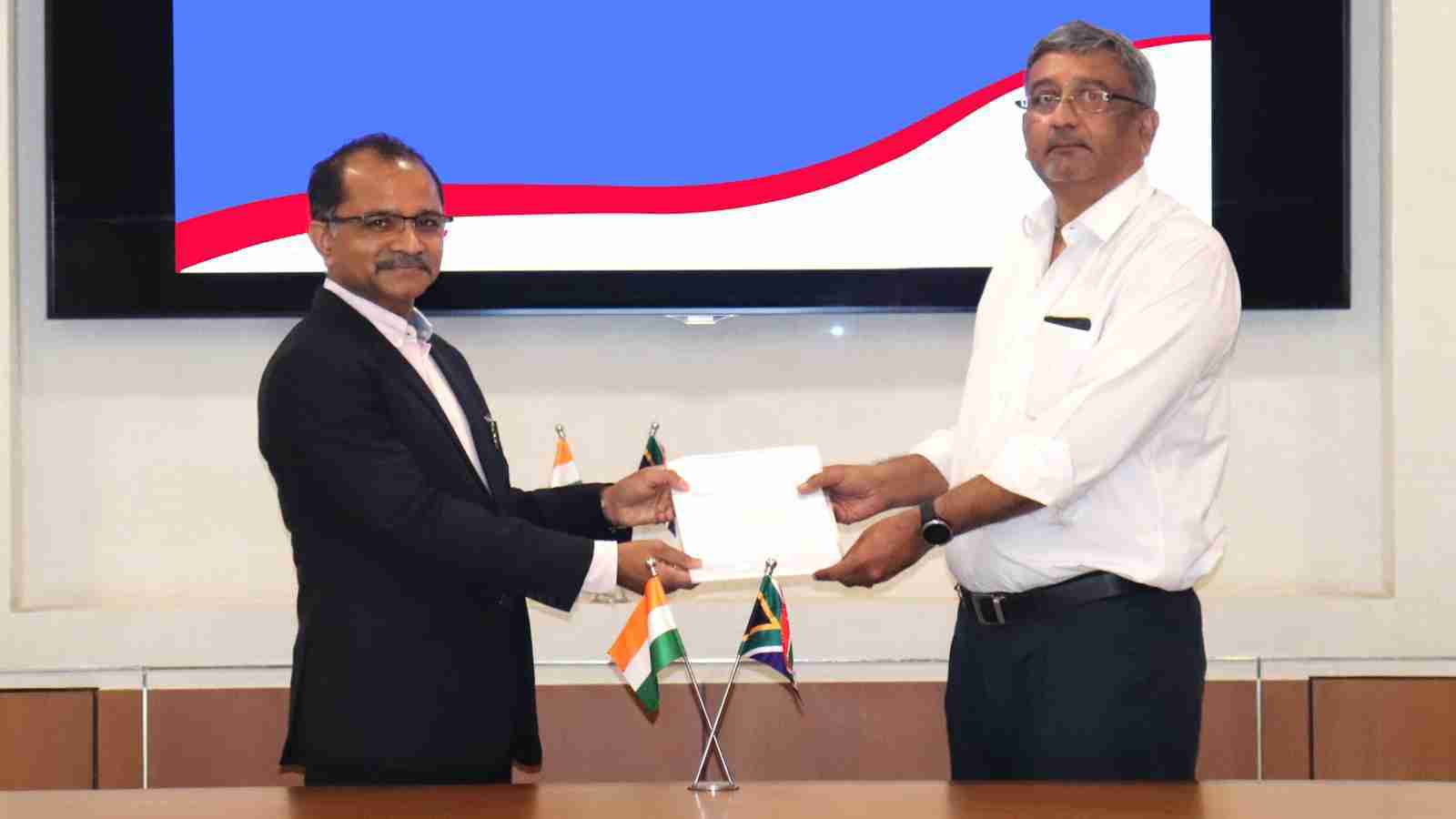 Mr. Rajeev Saxena, Director, ETGL with Mr. R Dilip, President – International Business, TVS Motor Company