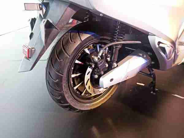 Bounce Infinity E1 electric scooter swingarm and rear disc brake